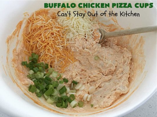 Buffalo Chicken Pizza Cups | Can't Stay Out of the Kitchen | these scrumptious miniature #pizzas include #BuffaloChickenDip in the centers & they're topped with 3 #cheeses including #mozzarella, #TacoCheese & #BlueCheese crumbles. Sensational #appetizer for #holidays, #tailgating parties, potlucks or the #SuperBowl. #BuffaloChicken #chicken #BuffaloChickenPizzaCups