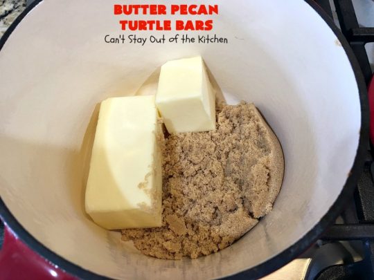 Butter Pecan Turtle Bars | These amazing layered #cookies have a shortbread crust. They're topped with #pecans & a homemade #caramel layer. Then they're covered with #chocolatechips while hot. That layer is spread into a delicious #chocolate icing. Perfect for #tailgating parties, soccer games, backyard barbecues, baby showers or potlucks. #ChocolateDessert #ButterPecanDessert #TurtleDessert #TurtleBars