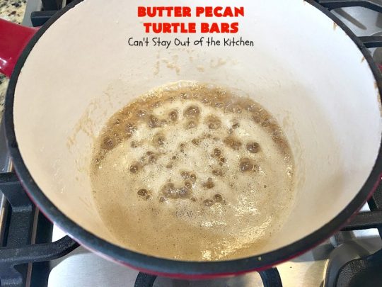Butter Pecan Turtle Bars | These amazing layered #cookies have a shortbread crust. They're topped with #pecans & a homemade #caramel layer. Then they're covered with #chocolatechips while hot. That layer is spread into a delicious #chocolate icing. Perfect for #tailgating parties, soccer games, backyard barbecues, baby showers or potlucks. #ChocolateDessert #ButterPecanDessert #TurtleDessert #TurtleBars