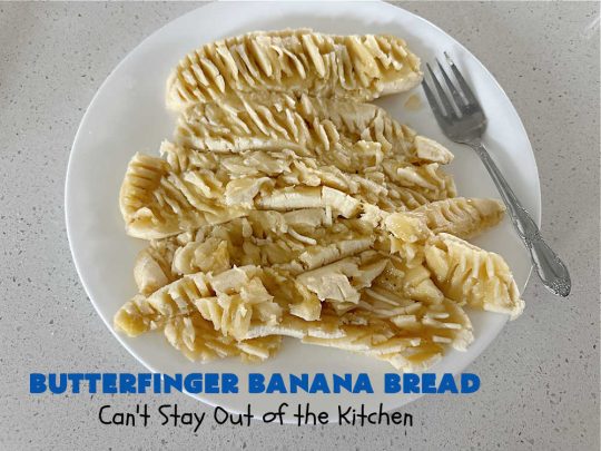 Butterfinger Banana Bread | Can't Stay Out of the Kitchen | No one will be able to resist this outrageous #ButterfingerBananaBread #recipe! It's fantastic for a weekend, company or #holiday #breakfast or #brunch. Every bite is chocked full of #Butterfingers so it has those great #chocolaty & #PeanutButter flavors that everyone loves. The rich, decadent #chocolate icing makes it even better! #SweetBread #ButterfingerCandyBars #ButterfingerCandy