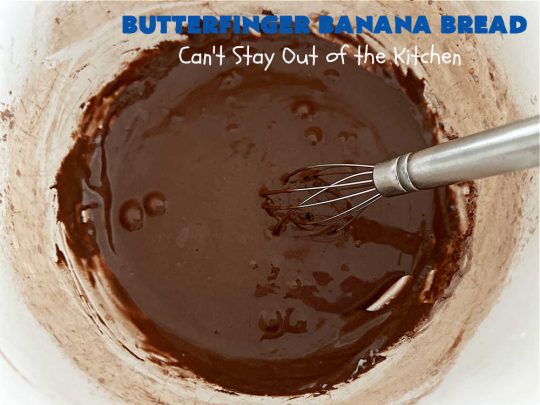 Butterfinger Banana Bread | Can't Stay Out of the Kitchen | No one will be able to resist this outrageous #ButterfingerBananaBread #recipe! It's fantastic for a weekend, company or #holiday #breakfast or #brunch. Every bite is chocked full of #Butterfingers so it has those great #chocolaty & #PeanutButter flavors that everyone loves. The rich, decadent #chocolate icing makes it even better! #SweetBread #ButterfingerCandyBars #ButterfingerCandy