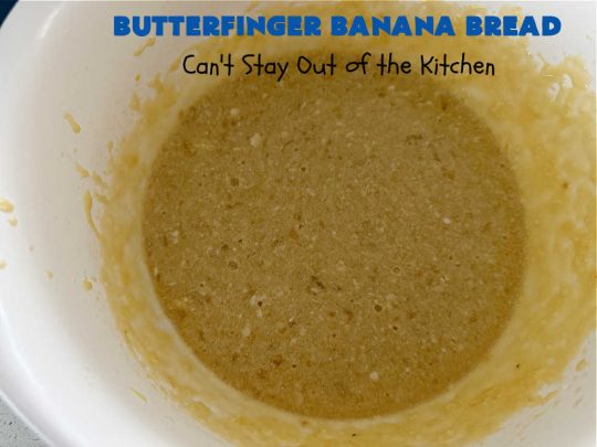 Butterfinger Banana Bread | Can't Stay Out of the Kitchen | No one will be able to resist this outrageous #ButterfingerBananaBread #recipe! It's fantastic for a weekend, company or #holiday #breakfast or #brunch. Every bite is chocked full of #Butterfingers so it has those great #chocolaty & #PeanutButter flavors that everyone loves. The rich, decadent #chocolate icing makes it even better! #SweetBread #ButterfingerCandyBars #ButterfingerCandy