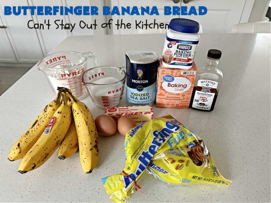 Butterfinger Banana Bread | Can't Stay Out of the Kitchen | No one will be able to resist this outrageous #ButterfingerBananaBread #recipe! It's fantastic for a weekend, company or #holiday #breakfast or #brunch. Every bite is chocked full of #Butterfingers so it has those great #chocolaty & #PeanutButter flavors that everyone loves. The rich, decadent #chocolate icing makes it even better! #SweetBread #ButterfingerCandyBars #ButterfingerCandy