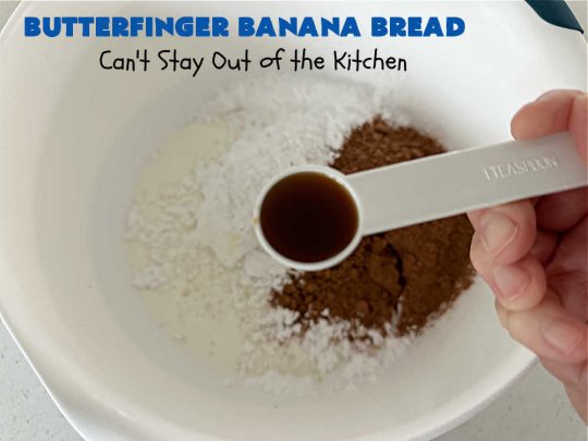 Butterfinger Banana Bread | Can't Stay Out of the Kitchen | No one will be able to resist this outrageous #ButterfingerBananaBread #recipe! It's fantastic for a weekend, company or #holiday #breakfast or #brunch. Every bite is chocked full of #Butterfingers so it has those great #chocolaty & #PeanutButter flavors that everyone loves. The rich, decadent #chocolate icing makes it even better! #SweetBread #ButterfingerCandyBars #ButterfingerCandy