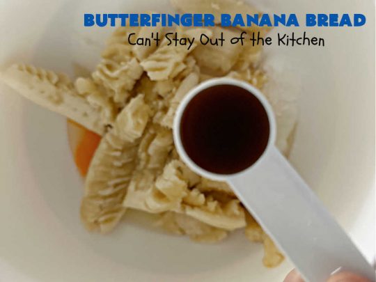 Butterfinger Banana Bread | Can't Stay Out of the Kitchen | No one will be able to resist this outrageous #ButterfingerBananaBread #recipe! It's fantastic for a weekend, company or #holiday #breakfast or #brunch. Every bite is chocked full of #Butterfingers so it has those great #chocolaty & #PeanutButter flavors that everyone loves. The rich, decadent #chocolate icing makes it even better! #SweetBread #ButterfingerCandyBars #ButterfingerCandy