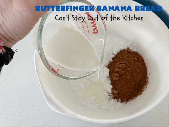 Butterfinger Banana Bread | Can't Stay Out of the Kitchen | No one will be able to resist this outrageous #ButterfingerBananaBread #recipe! It's fantastic for a weekend, company or #holiday #breakfast or #brunch. Every bite is chocked full of #Butterfingers so it has those great #chocolaty & #PeanutButter flavors that everyone loves. The rich, decadent #chocolate icing makes it even better! #SweetBread #ButterfingerCandyBars #ButterfingerCandy