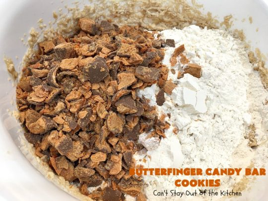Butterfinger Candy Bar Cookies | Can't Stay Out of the Kitchen | these fantastic #cookies rock! They're filled with chopped #Butterfinger bars so they're absolutely mouthwatering & delicious. Great for #holiday or #tailgating parties or a #ChristmasCookieExchange. #dessert #HowToUseHalloweenCandy #ButterfingerBars #ButterfingerCandyBars #chocolate #ChocolateDessert #PeanutButter #PeanutButterDessert #ButterfingerDessert #ButterfingerCandyBarCookies #HolidayDessert