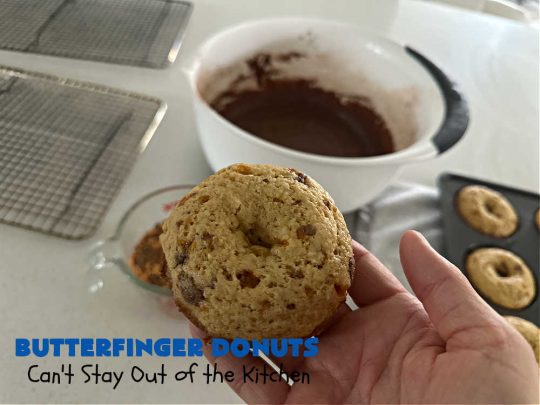 Butterfinger Donuts | Can't Stay Out of the Kitchen | Prepare to swoon over every delicious bite of #ButterfingerDonuts! These luscious #donuts include #Butterfingers in the donut as well as on top of the #ChocolateFrosting. Every bite will rock your world! Terrific for a weekend, company or #holiday breakfast or #brunch. #HolidayBreakfast #BakedDonuts #ButterfingerCandyBars