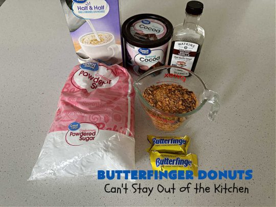 Butterfinger Donuts | Can't Stay Out of the Kitchen | Prepare to swoon over every delicious bite of #ButterfingerDonuts! These luscious #donuts include #Butterfingers in the donut as well as on top of the #ChocolateFrosting. Every bite will rock your world! Terrific for a weekend, company or #holiday breakfast or #brunch. #HolidayBreakfast #BakedDonuts #ButterfingerCandyBars