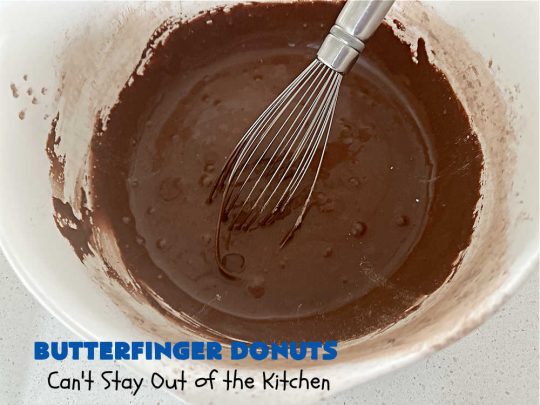 Butterfinger Donuts | Can't Stay Out of the Kitchen | Prepare to swoon over every delicious bite of #ButterfingerDonuts! These luscious #donuts include #Butterfingers in the donut as well as on top of the #ChocolateFrosting. Every bite will rock your world! Terrific for a weekend, company or #holiday breakfast or #brunch. #HolidayBreakfast #BakedDonuts #ButterfingerCandyBarsButterfinger Donuts | Can't Stay Out of the Kitchen | Prepare to swoon over every delicious bite of #ButterfingerDonuts! These luscious #donuts include #Butterfingers in the donut as well as on top of the #ChocolateFrosting. Every bite will rock your world! Terrific for a weekend, company or #holiday breakfast or #brunch. #HolidayBreakfast #BakedDonuts #ButterfingerCandyBars