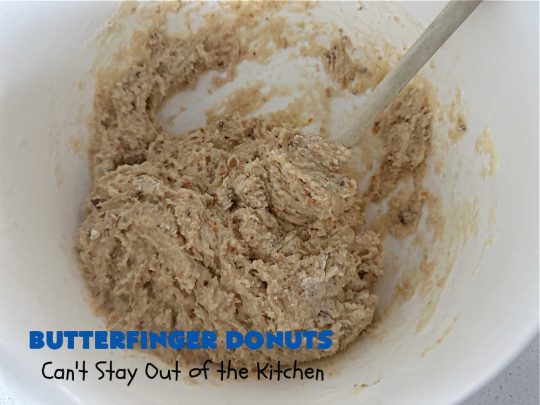 Butterfinger Donuts | Can't Stay Out of the Kitchen | Prepare to swoon over every delicious bite of #ButterfingerDonuts! These luscious #donuts include #Butterfingers in the donut as well as on top of the #ChocolateFrosting. Every bite will rock your world! Terrific for a weekend, company or #holiday breakfast or #brunch. #HolidayBreakfast #BakedDonuts #ButterfingerCandyBars