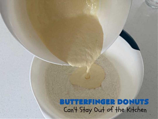 Butterfinger Donuts | Can't Stay Out of the Kitchen | Prepare to swoon over every delicious bite of #ButterfingerDonuts! These luscious #donuts include #Butterfingers in the donut as well as on top of the #ChocolateFrosting. Every bite will rock your world! Terrific for a weekend, company or #holiday breakfast or #brunch. #HolidayBreakfast #BakedDonuts #ButterfingerCandyBars
