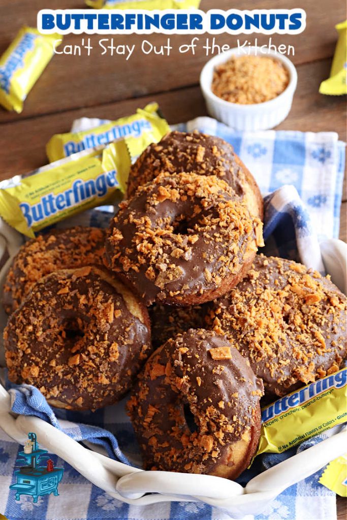 Butterfinger Donuts | Can't Stay Out of the Kitchen | Prepare to swoon over every delicious bite of #ButterfingerDonuts! These luscious #donuts include #Butterfingers in the donut as well as on top of the #ChocolateFrosting. Every bite will rock your world! Terrific for a weekend, company or #holiday breakfast or #brunch. #HolidayBreakfast #BakedDonuts #ButterfingerCandyBars