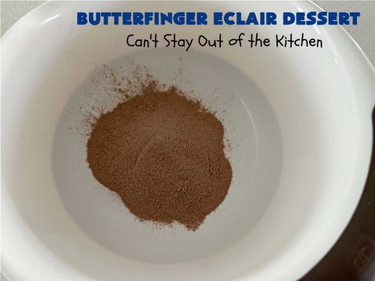 Butterfinger Éclair Dessert | Can't Stay Out of the Kitchen | this spectacular #ButterfingerÉclairDessert uses only 6 ingredients & is the perfect #dessert for company or #holidays. It serves a crowd & everyone enjoys the #GrahamCracker, #ChocolatePudding & #ChocolateFrosting layers that mimic Éclairs. You & your friends will swoon over this delicious #ButterfingerDessert. #Chocolate #ChocolateDessert #ButterfingerCandyBars