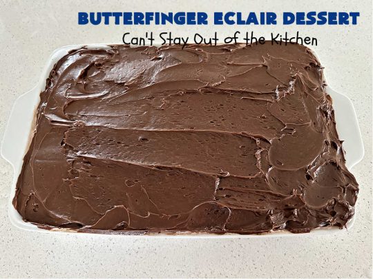 Butterfinger Éclair Dessert | Can't Stay Out of the Kitchen | this spectacular #ButterfingerÉclairDessert uses only 6 ingredients & is the perfect #dessert for company or #holidays. It serves a crowd & everyone enjoys the #GrahamCracker, #ChocolatePudding & #ChocolateFrosting layers that mimic Éclairs. You & your friends will swoon over this delicious #ButterfingerDessert. #Chocolate #ChocolateDessert #ButterfingerCandyBars