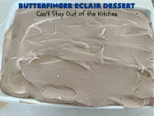 Butterfinger Éclair Dessert | Can't Stay Out of the Kitchen | this spectacular #ButterfingerÉclairDessert uses only 6 ingredients & is the perfect #dessert for company or #holidays. It serves a crowd & everyone enjoys the #GrahamCracker, #ChocolatePudding & #ChocolateFrosting layers that mimic Éclairs. You & your friends will swoon over this delicious #ButterfingerDessert. #Chocolate #ChocolateDessert #ButterfingerCandyBars