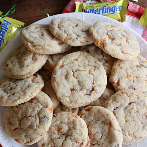 Butterfinger Meltaways | Can't Stay Out of the Kitchen | these melt-in-your-mouth #cookies are outrageously good! They are filled with #ButterfingerCandyBars & dissolve in your mouth upon contact! Prepare to swoon over every delicious bite. #Butterfingers #ButterfingerDessert #chocolate #holiday #ChristmasCookieExchange #PeanutButter #ButterfingerMeltaways