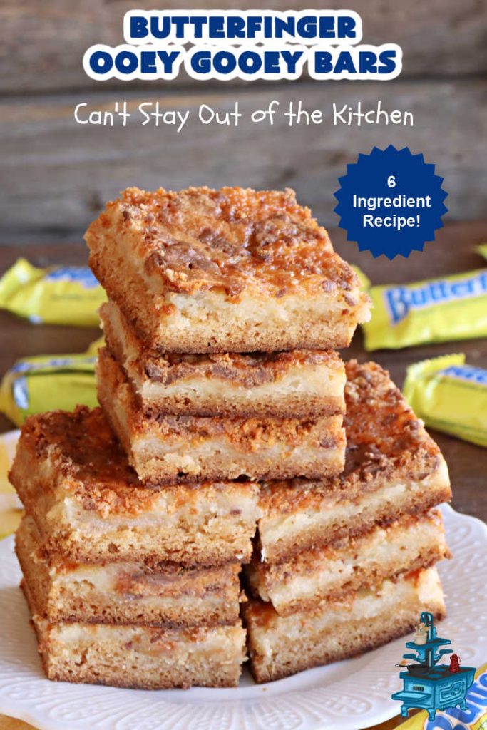 Butterfinger Ooey Gooey Bars | Can't Stay Out of the Kitchen | these lovely #OoeyGooeyBars include a #Cheesecake filling with chopped #Butterfingers on top! This easy 6-ingredient #recipe is so irresistible everyone will want seconds. They are out of this world good & will have you swooning from the first bite. Excellent for #tailgating, potlucks & a #ChristmasCookieExchange. #cookie #brownie #dessert #ButterfingerDessert #ButterfingerOoeyGooeyBars