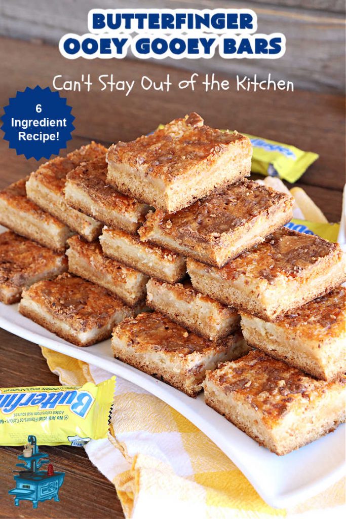 Butterfinger Ooey Gooey Bars | Can't Stay Out of the Kitchen | these lovely #OoeyGooeyBars include a #Cheesecake filling with chopped #Butterfingers on top! This easy 6-ingredient #recipe is so irresistible everyone will want seconds. They are out of this world good & will have you swooning from the first bite. Excellent for #tailgating, potlucks & a #ChristmasCookieExchange. #cookie #brownie #dessert #ButterfingerDessert #ButterfingerOoeyGooeyBars