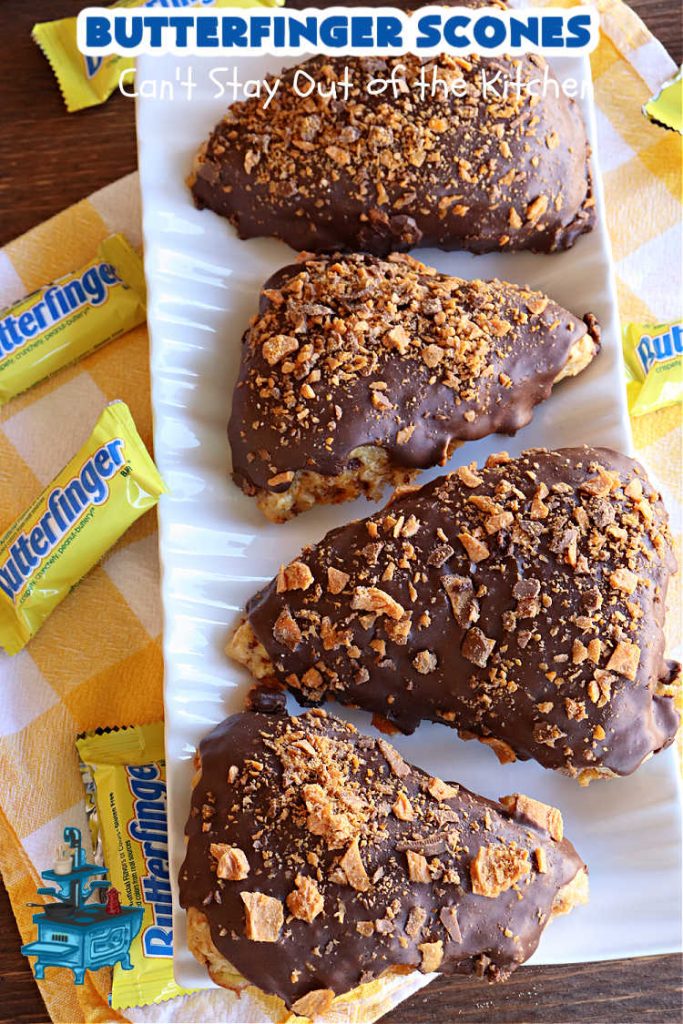Butterfinger Scones | Can't Stay Out of the Kitchen | Delight your family & friends with these spectacular #ButterfingerScones on your next #breakfast buffet. After just one bite they'll be swooning. These luscious #scones are sweeter than the traditional variety & include #Butterfingers & a luscious #chocolate #icing with more #ButterfingerCandyBars sprinkled over top. Perfect for a weekend, company or #holiday breakfast. Utterly irresistible! #chocolate #PeanutButter #HolidayBreakfast