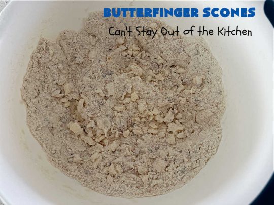 Butterfinger Scones | Can't Stay Out of the Kitchen | Delight your family & friends with these spectacular #ButterfingerScones on your next #breakfast buffet. After just one bite they'll be swooning. These luscious #scones are sweeter than the traditional variety & include #Butterfingers & a luscious #chocolate #icing with more #ButterfingerCandyBars sprinkled over top. Perfect for a weekend, company or #holiday breakfast. Utterly irresistible! #chocolate #PeanutButter #HolidayBreakfast