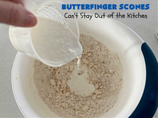 Butterfinger Scones | Can't Stay Out of the Kitchen | Delight your family & friends with these spectacular #ButterfingerScones on your next #breakfast buffet. After just one bite they'll be swooning. These luscious #scones are sweeter than the traditional variety & include #Butterfingers & a luscious #chocolate #icing with more #ButterfingerCandyBars sprinkled over top. Perfect for a weekend, company or #holiday breakfast. Utterly irresistible! #chocolate #PeanutButter #HolidayBreakfast