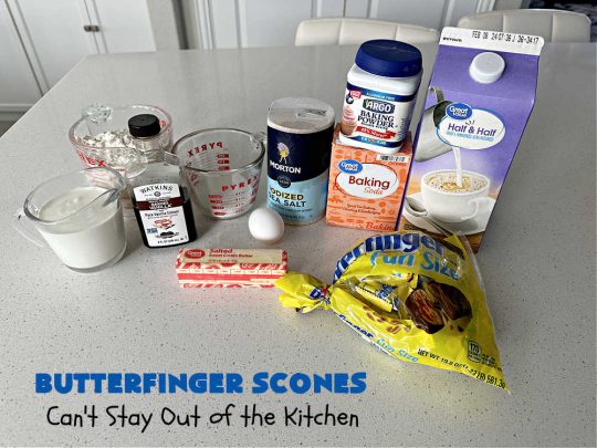 Butterfinger Scones | Can't Stay Out of the Kitchen | Delight your family & friends with these spectacular #ButterfingerScones on your next #breakfast buffet. After just one bite they'll be swooning. These luscious #scones are sweeter than the traditional variety & include #Butterfingers & a luscious #chocolate #icing with more #ButterfingerCandyBars sprinkled over top. Perfect for a weekend, company or #holiday breakfast. Utterly irresistible! #chocolate #PeanutButter #HolidayBreakfast