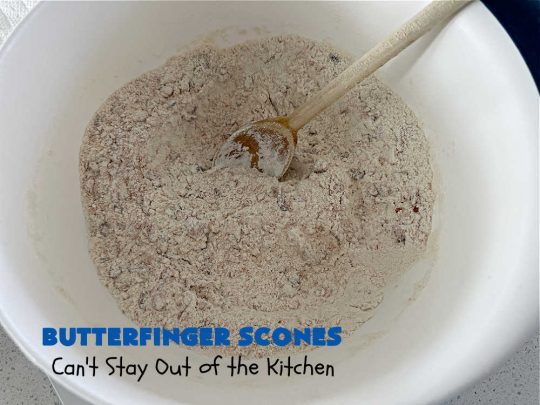 Butterfinger Scones | Can't Stay Out of the Kitchen | Delight your family & friends with these spectacular #ButterfingerScones on your next #breakfast buffet. After just one bite they'll be swooning. These luscious #scones are sweeter than the traditional variety & include #Butterfingers & a luscious #chocolate #icing with more #ButterfingerCandyBars sprinkled over top. Perfect for a weekend, company or #holiday breakfast. Utterly irresistible! #chocolate #PeanutButter #HolidayBreakfast