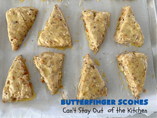 Butterfinger Scones | Can't Stay Out of the Kitchen | Delight your family & friends with these spectacular #ButterfingerScones on your next #breakfast buffet. After just one bite they'll be swooning. These luscious #scones are sweeter than the traditional variety & include #Butterfingers & a luscious #chocolate #icing with more #ButterfingerCandyBars sprinkled over top. Perfect for a weekend, company or #holiday breakfast. Utterly irresistible! #chocolate #PeanutButter #HolidayBreakfast
