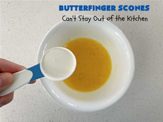 Butterfinger Scones | Can't Stay Out of the Kitchen | Delight your family & friends with these spectacular #ButterfingerScones on your next #breakfast buffet. After just one bite they'll be swooning. These luscious #scones are sweeter than the traditional variety & include #Butterfingers & a luscious #chocolate #icing with more #ButterfingerCandyBars sprinkled over top. Perfect for a weekend, company or #holiday breakfast. Utterly irresistible! #chocolate #PeanutButter #HolidayBreakfast
