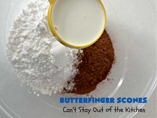 Butterfinger Scones | Can't Stay Out of the Kitchen | Delight your family & friends with these spectacular #ButterfingerScones on your next #breakfast buffet. After just one bite they'll be swooning. These luscious #scones are sweeter than the traditional variety & include #Butterfingers & a luscious #chocolate #icing with more #ButterfingerCandyBars sprinkled over top. Perfect for a weekend, company or #holiday breakfast. Utterly irresistible! #chocolate #PeanutButter #HolidayBreakfast