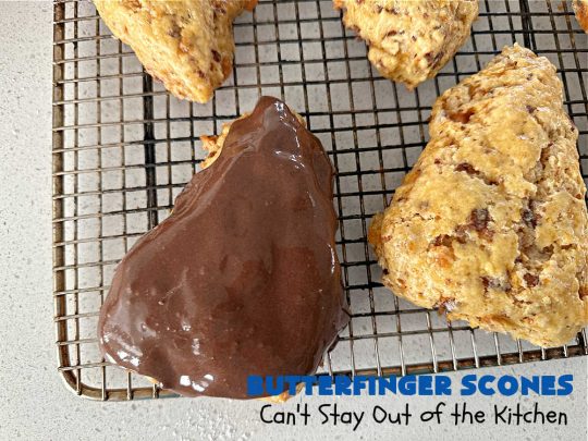 Butterfinger Scones | Can't Stay Out of the Kitchen | Delight your family & friends with these spectacular #ButterfingerScones on your next #breakfast buffet. After just one bite they'll be swooning. These luscious #scones are sweeter than the traditional variety & include #Butterfingers & a luscious #chocolate #icing with more #ButterfingerCandyBars sprinkled over top. Perfect for a weekend, company or #holiday breakfast. Utterly irresistible! #chocolate #PeanutButter #HolidayBreakfast