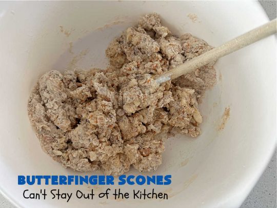 Butterfinger Scones | Can't Stay Out of the Kitchen | Delight your family & friends with these spectacular #ButterfingerScones on your next #breakfast buffet. After just one bite they'll be swooning. These luscious #scones are sweeter than the traditional variety & include #Butterfingers & a luscious #chocolate #icing with more #ButterfingerCandyBars sprinkled over top. Perfect for a weekend, company or #holiday breakfast. Utterly irresistible! #chocolate #PeanutButter #HolidayBreakfast