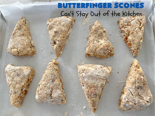 Butterfinger Scones | Can't Stay Out of the Kitchen | Delight your family & friends with these spectacular #ButterfingerScones on your next #breakfast buffet. After just one bite they'll be swooning. These luscious #scones are sweeter than the traditional variety & include #Butterfingers & a luscious #chocolate #icing with more #ButterfingerCandyBars sprinkled over top. Perfect for a weekend, company or #holiday breakfast. Utterly irresistible! #chocolate #PeanutButter #HolidayBreakfast