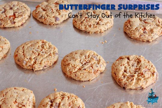 Butterfinger Surprises | Can't Stay Out of the Kitchen | these luscious #PeanutButterCookies include #ButterfingerBits in every bite. These whopper-sized #cookies will knock your socks off! If you enjoy #PeanutButter #chocolate & #Butterfingers, this #dessert will make your day! #ChocolateDessert #PeanutButterDessert #Butterfinger Dessert #holiday #HolidayBaking #HolidayDessert #ButterfingerSurprises
