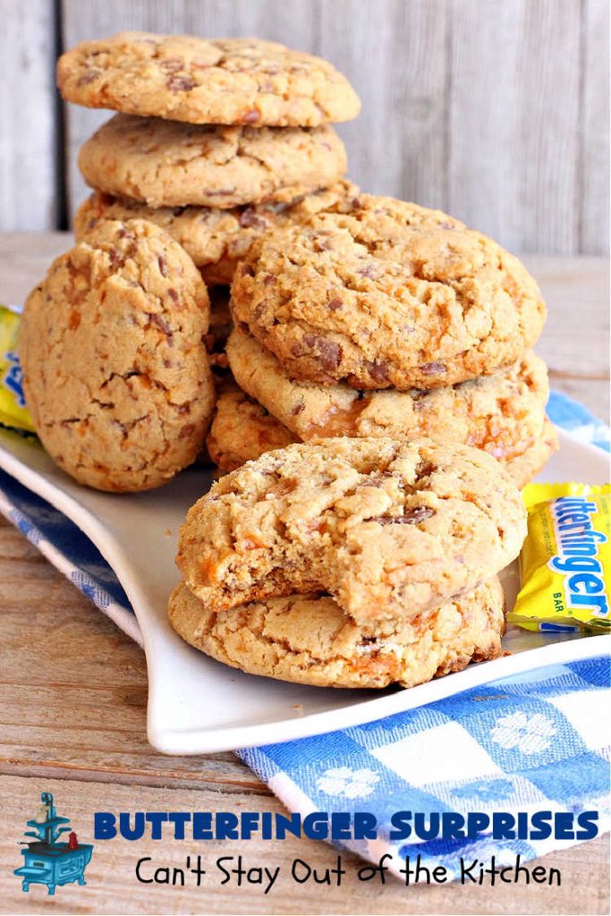 Butterfinger Surprises | Can't Stay Out of the Kitchen | these luscious #PeanutButterCookies include #ButterfingerBits in every bite. These whopper-sized #cookies will knock your socks off! If you enjoy #PeanutButter #chocolate & #Butterfingers, this #dessert will make your day! #ChocolateDessert #PeanutButterDessert #Butterfinger Dessert #holiday #HolidayBaking #HolidayDessert #ButterfingerSurprises