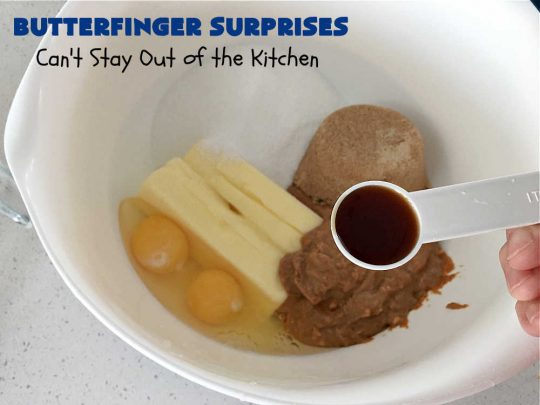 Butterfinger Surprises | Can't Stay Out of the Kitchen | these luscious #PeanutButterCookies include #ButterfingerBits in every bite. These whopper-sized #cookies will knock your socks off! If you enjoy #PeanutButter #chocolate & #Butterfingers, this #dessert will make your day! #ChocolateDessert #PeanutButterDessert #Butterfinger Dessert #holiday #HolidayBaking #HolidayDessert #ButterfingerSurprises