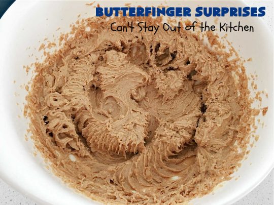 Butterfinger Surprises | Can't Stay Out of the Kitchen | these luscious #PeanutButterCookies include #ButterfingerBits in every bite. These whopper-sized #cookies will knock your socks off! If you enjoy #PeanutButter #chocolate & #Butterfingers, this #dessert will make your day! #ChocolateDessert #PeanutButterDessert #Butterfinger Dessert #holiday #HolidayBaking #HolidayDessert #ButterfingerSurprises