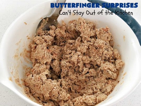 Butterfinger Surprises | Can't Stay Out of the Kitchen | these luscious #PeanutButterCookies include #ButterfingerBits in every bite. These whopper-sized #cookies will knock your socks off! If you enjoy #PeanutButter #chocolate & #Butterfingers, this #dessert will make your day! #ChocolateDessert #PeanutButterDessert #Butterfinger Dessert #holiday #HolidayBaking #HolidayDessert #ButterfingerSurprises