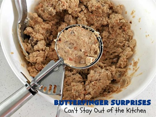 Butterfinger Surprises | Can't Stay Out of the Kitchen | these luscious #PeanutButterCookies include #ButterfingerBits in every bite. These whopper-sized #cookies will knock your socks off! If you enjoy #PeanutButter #chocolate & #Butterfingers, this #dessert will make your day! #ChocolateDessert #PeanutButterDessert #Butterfinger Dessert #holiday #HolidayBaking #HolidayDessert #ButterfingerSurprises