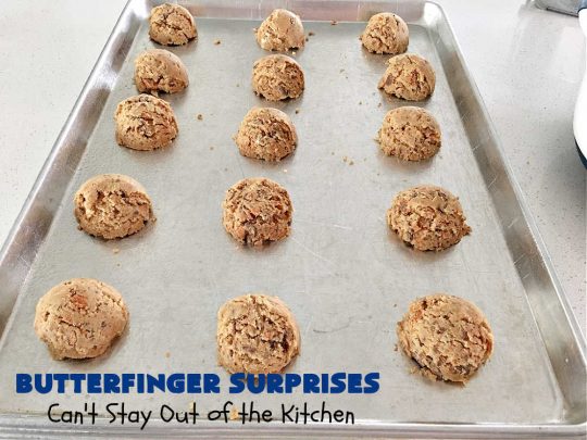 Butterfinger Surprises | Can't Stay Out of the Kitchen | these luscious #PeanutButterCookies include #ButterfingerBits in every bite. These whopper-sized #cookies will knock your socks off! If you enjoy #PeanutButter #chocolate & #Butterfingers, this #dessert will make your day! #ChocolateDessert #PeanutButterDessert #Butterfinger Dessert #holiday #HolidayBaking #HolidayDessert #ButterfingerSurprises