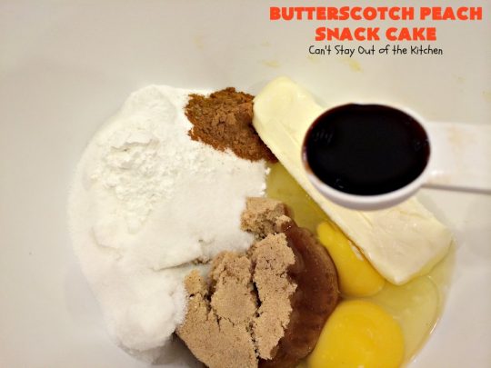 Butterscotch Peach Snack Cake | Can't Stay Out of the Kitchen | this outrageous #cake is absolutely divine! It's filled with #peaches & #butterscotchchips. Then it's glazed with #butterscotch icing. This #dessert is rich, decadent & absolutely irresistible. It's marvelous for #holidays like #FathersDay or #FourthofJuly.