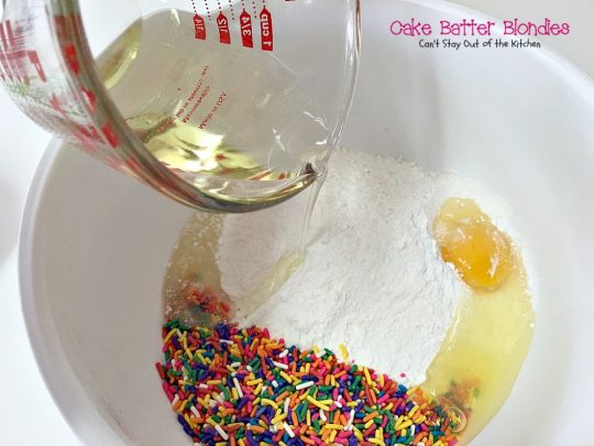 Cake Batter Blondies | Can't Stay Out of the Kitchen | the most awesome blondies ever! These are filled with #whitechocolatechips & #rainbowsprinkles for a heavenly taste you'll be drooling over! #chocolate #dessert