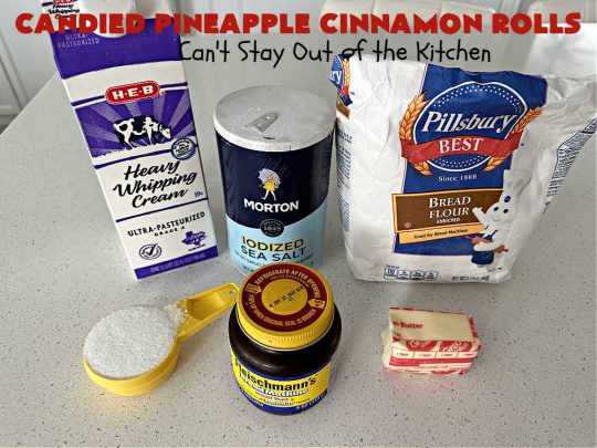 Candied Pineapple Cinnamon Rolls | Can't Stay Out of the Kitchen | These luscious #CinnamonRolls include #CandiedPineapple & they're iced with a thick, drool-worthy #buttercream icing. Every bite will rock your world! Enjoy for a #holiday #breakfast or #brunch. #Thanksgiving #Christmas #ParadiseFruit #pineapple #SweetRolls #HolidayBreakfast