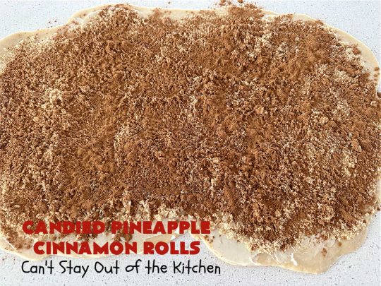 Candied Pineapple Cinnamon Rolls | Can't Stay Out of the Kitchen | These luscious #CinnamonRolls include #CandiedPineapple & they're iced with a thick, drool-worthy #buttercream icing. Every bite will rock your world! Enjoy for a #holiday #breakfast or #brunch. #Thanksgiving #Christmas #ParadiseFruit #pineapple #SweetRolls #HolidayBreakfast