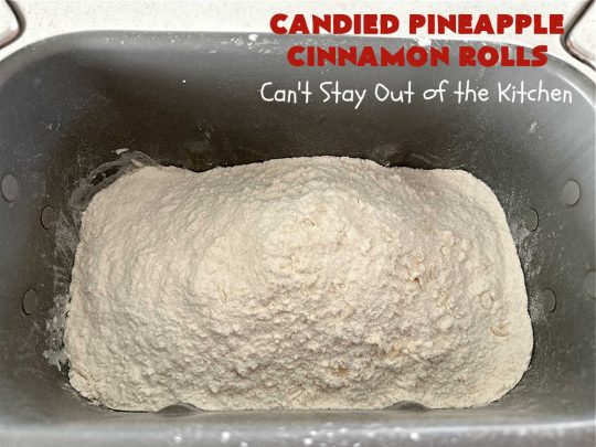 Candied Pineapple Cinnamon Rolls | Can't Stay Out of the Kitchen | These luscious #CinnamonRolls include #CandiedPineapple & they're iced with a thick, drool-worthy #buttercream icing. Every bite will rock your world! Enjoy for a #holiday #breakfast or #brunch. #Thanksgiving #Christmas #ParadiseFruit #pineapple #SweetRolls #HolidayBreakfast