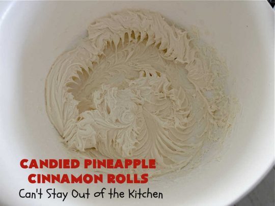 Candied Pineapple Cinnamon Rolls | Can't Stay Out of the Kitchen | These luscious #CinnamonRolls include #CandiedPineapple & they're iced with a thick, drool-worthy #buttercream icing. Every bite will rock your world! Enjoy for a #holiday #breakfast or #brunch. #Thanksgiving #Christmas #ParadiseFruit #pineapple #SweetRolls #HolidayBreakfast