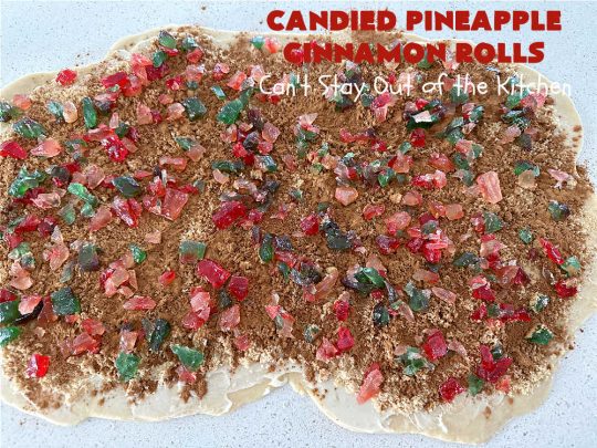 Candied Pineapple Cinnamon Rolls | Can't Stay Out of the Kitchen | These luscious #CinnamonRolls include #CandiedPineapple & they're iced with a thick, drool-worthy #buttercream icing. Every bite will rock your world! Enjoy for a #holiday #breakfast or #brunch. #Thanksgiving #Christmas #ParadiseFruit #pineapple #SweetRolls #HolidayBreakfast