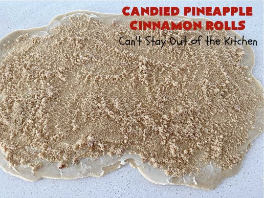 Candied Pineapple Cinnamon Rolls | Can't Stay Out of the Kitchen | These luscious #CinnamonRolls include #CandiedPineapple & they're iced with a thick, drool-worthy #buttercream icing. Every bite will rock your world! Enjoy for a #holiday #breakfast or #brunch. #Thanksgiving #Christmas #ParadiseFruit #pineapple #SweetRolls #HolidayBreakfast