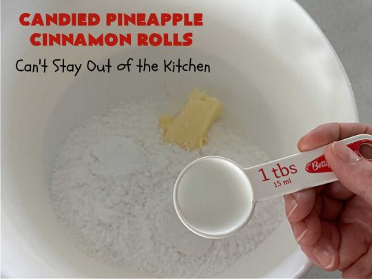 Candied Pineapple Cinnamon Rolls | Can't Stay Out of the Kitchen | These luscious #CinnamonRolls include #CandiedPineapple & they're iced with a thick, drool-worthy #buttercream icing. Every bite will rock your world! Enjoy for a #holiday #breakfast or #brunch. #Thanksgiving #Christmas #ParadiseFruit #pineapple #SweetRolls #HolidayBreakfast